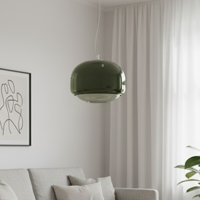 Groene Clinco glazen hanglamp boven een bank