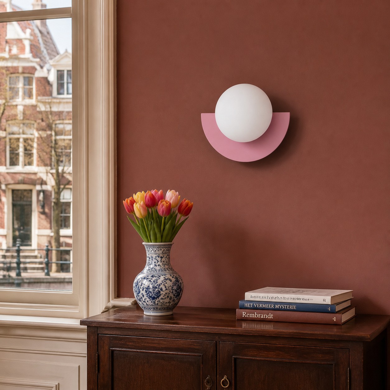 Twee groene Macaron wandlampen rond een raam