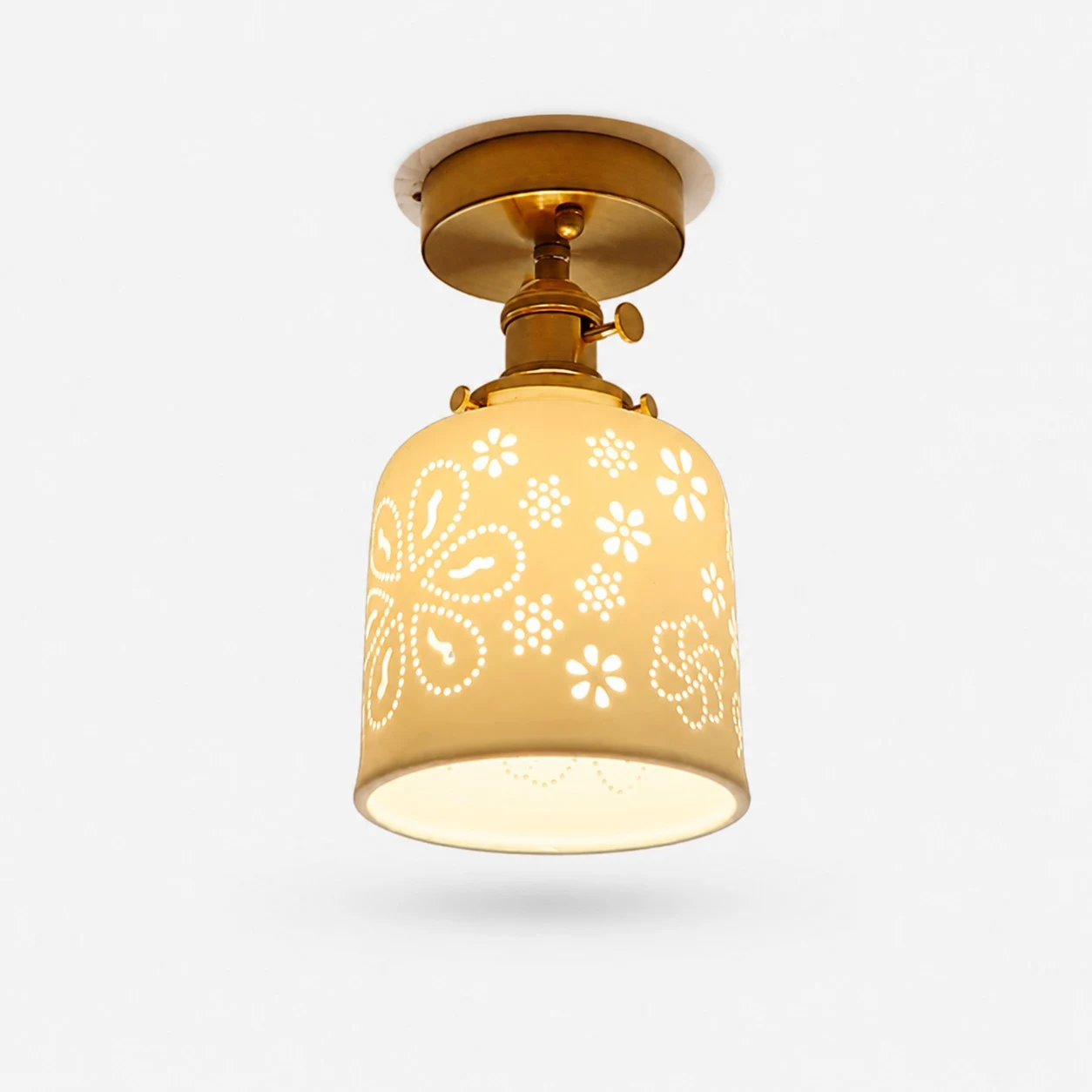 Flush mount floral ceramic ceiling light with brass canopy