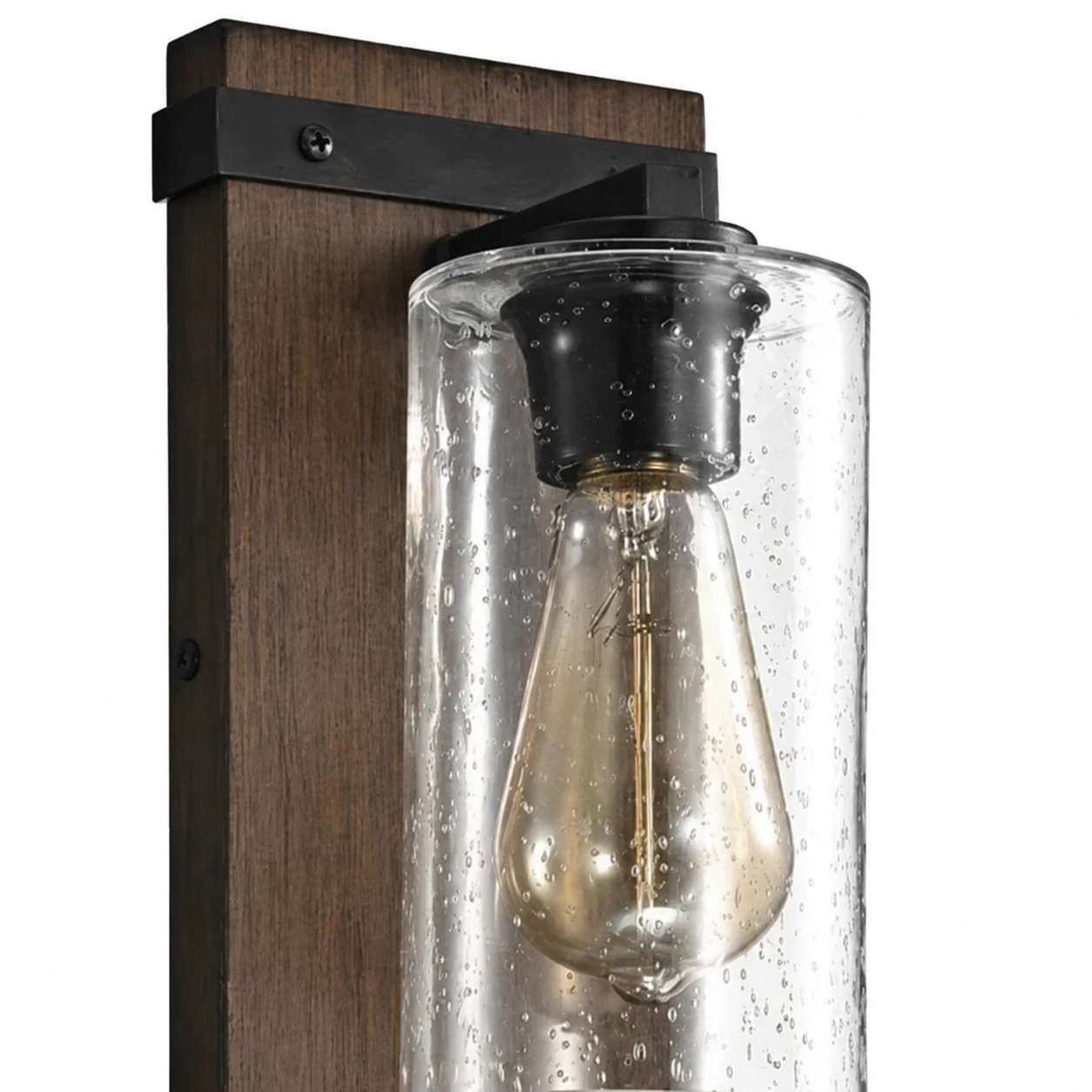 Close detail of clear seeded glass shade and bulb