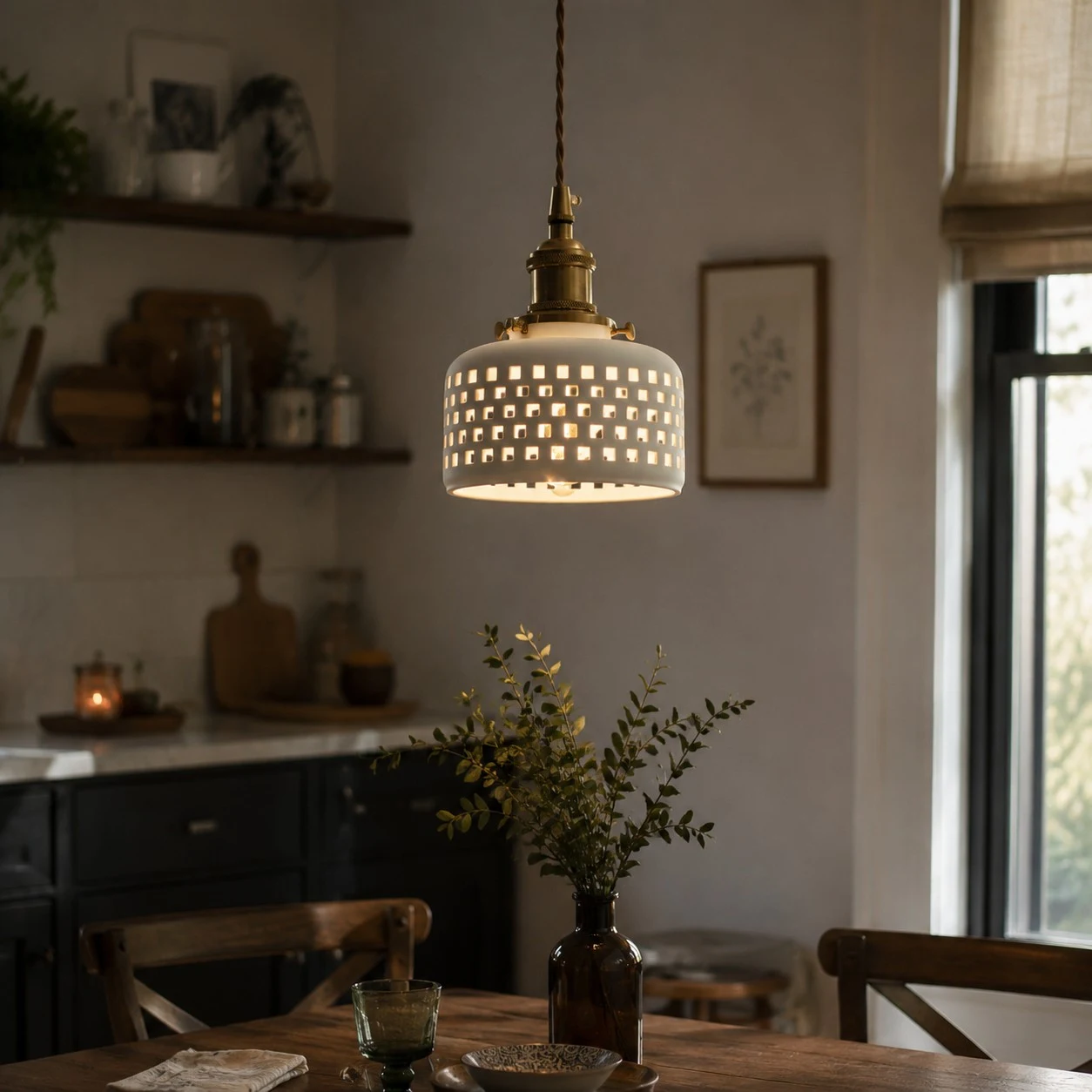 Grid cutout ceramic pendant light in a dining room