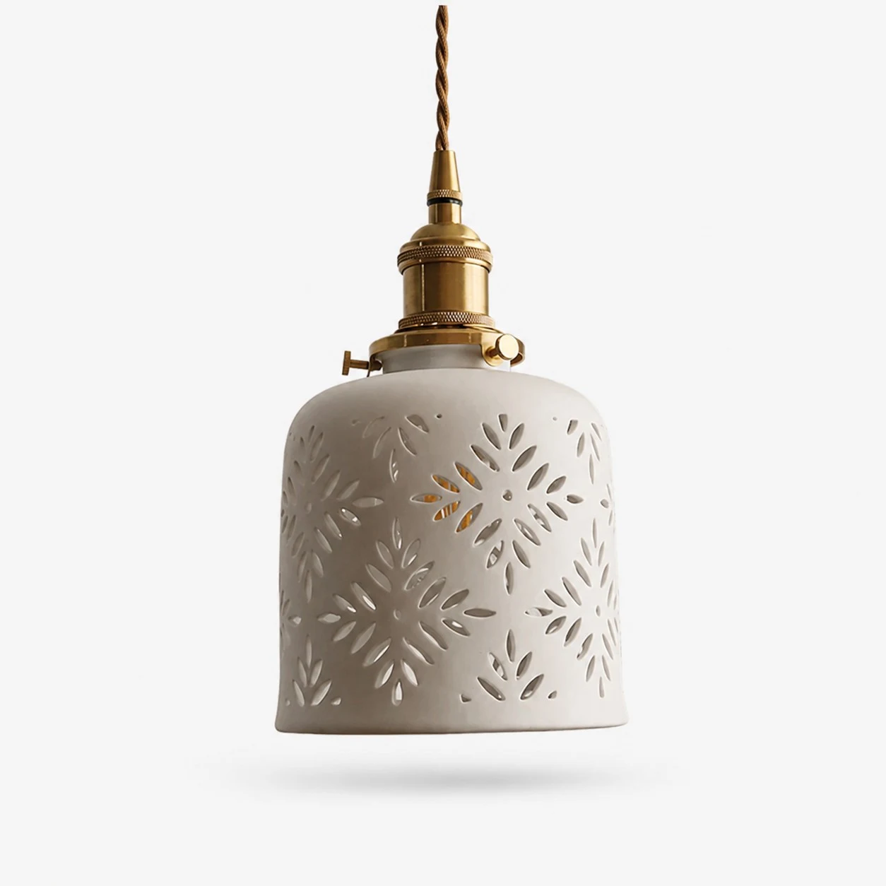Starflower cutout ceramic pendant light with brass hardware
