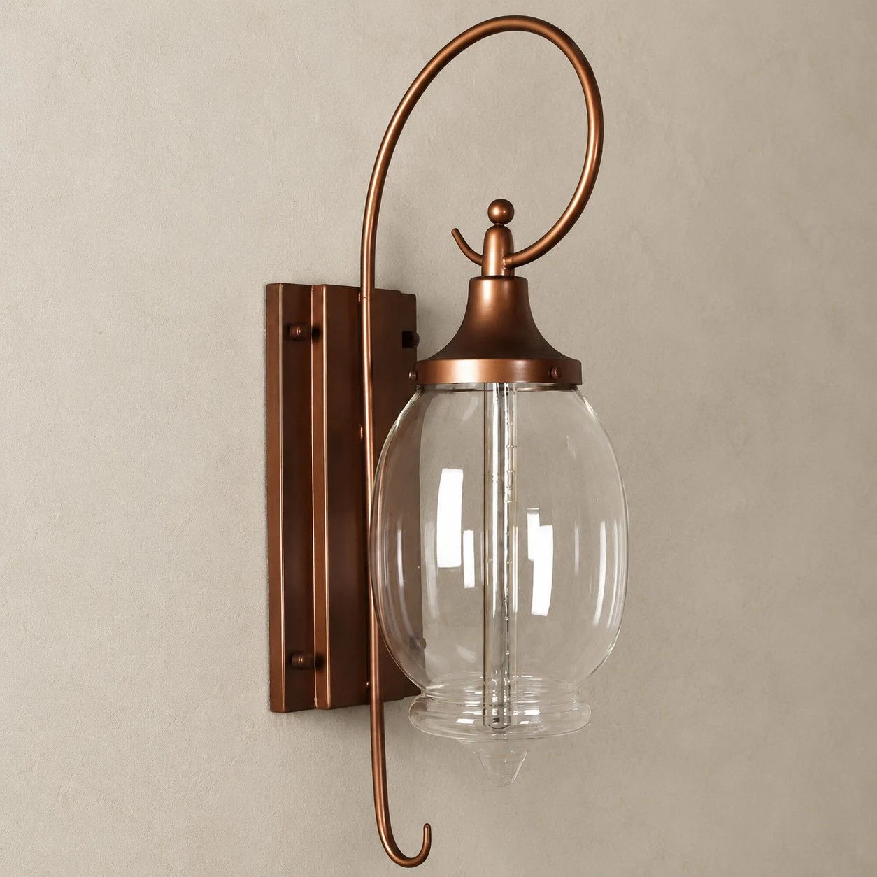 Wall lamp installed on a neutral wall, showing fixture profile