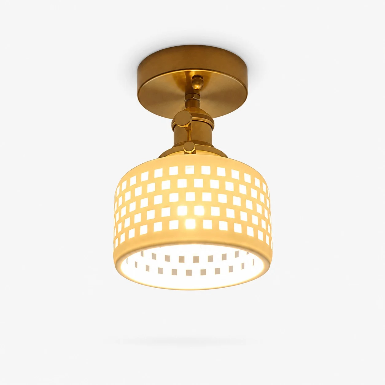 Flush mount grid ceramic ceiling light with brass canopy