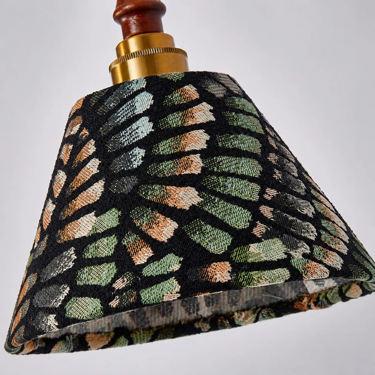 Fabric shade and wood hardware detail