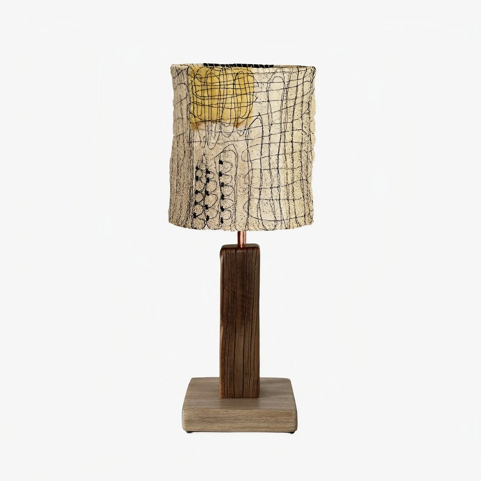 Yellow patch shade loofah table lamp on a white background