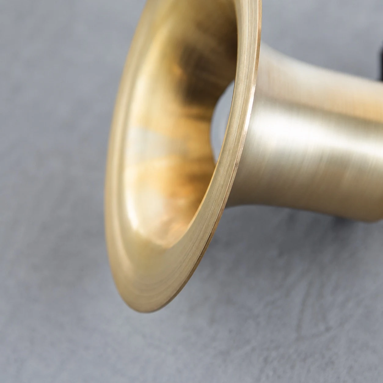 Close-up of brushed metal shade rim