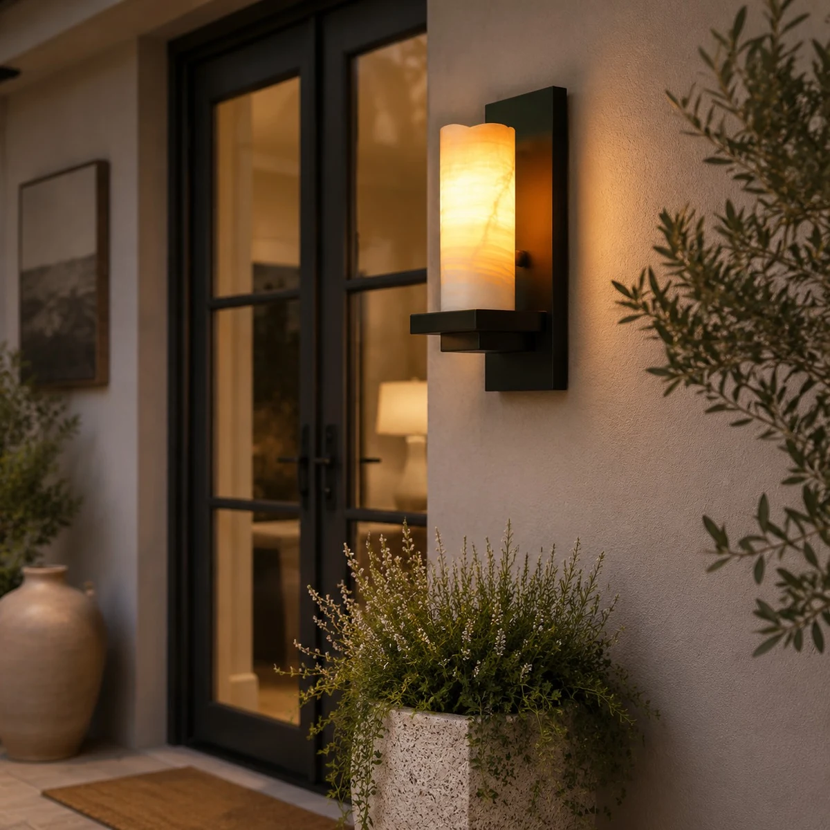 Outdoor entry wall sconce with warm ambience