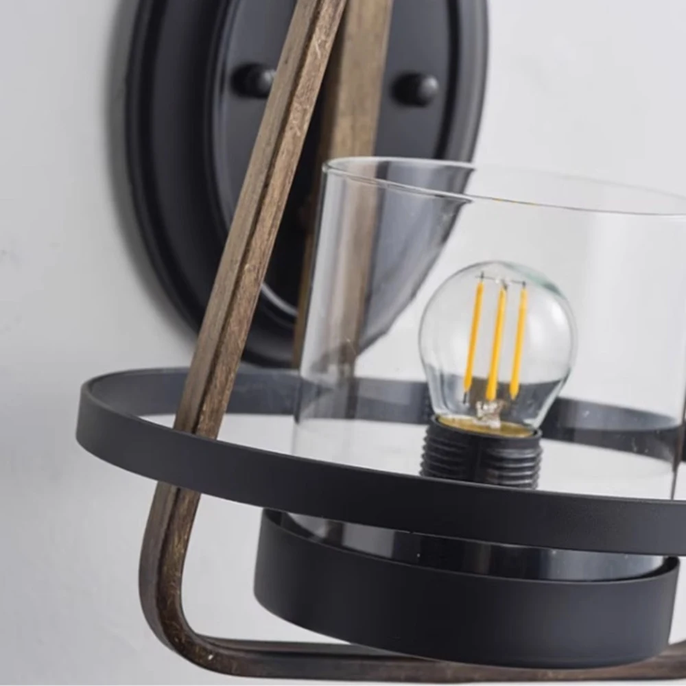 Clear glass shade and black metal lower ring detail