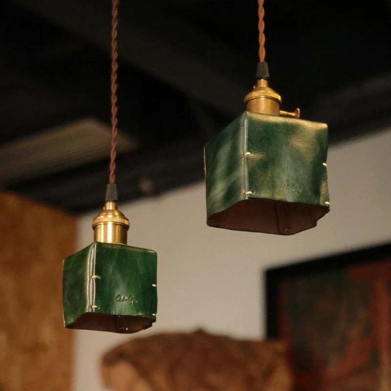 Two green pendants hanging together