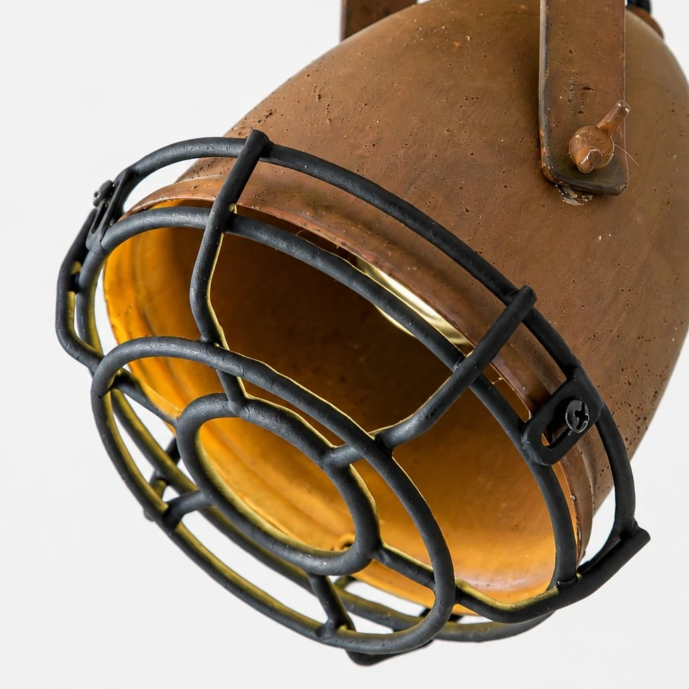 Black protective cage and rust metal shade detail