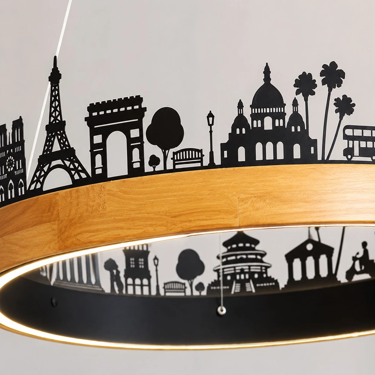Close-up of the city skyline silhouette and wood ring