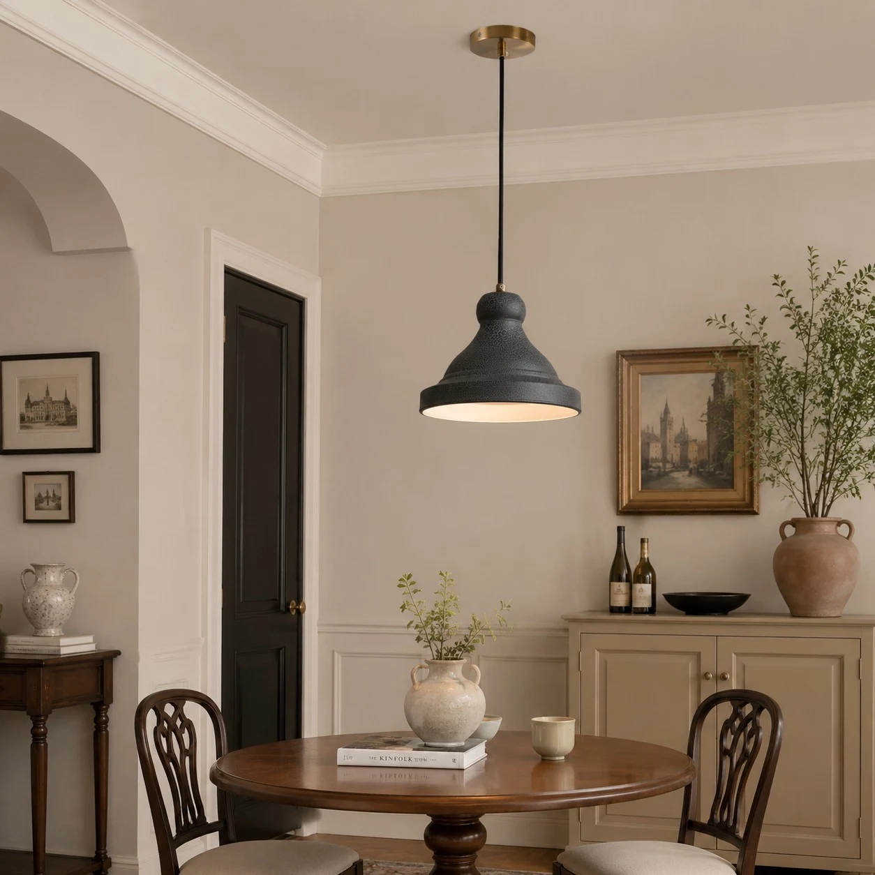 Gray metal pendant lamp in a round dining room scene