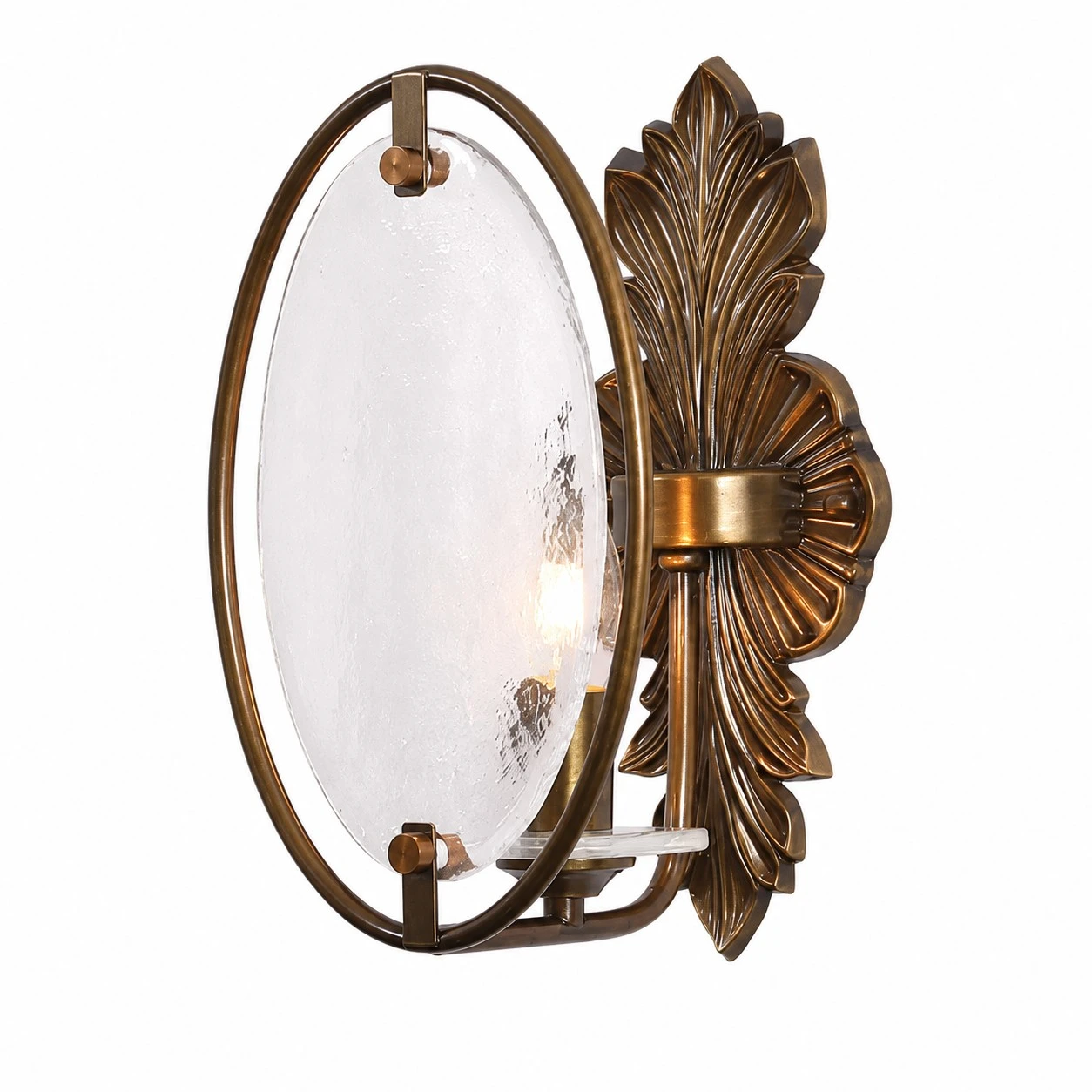 Side view of antique brass wall sconce with oval textured glass shade