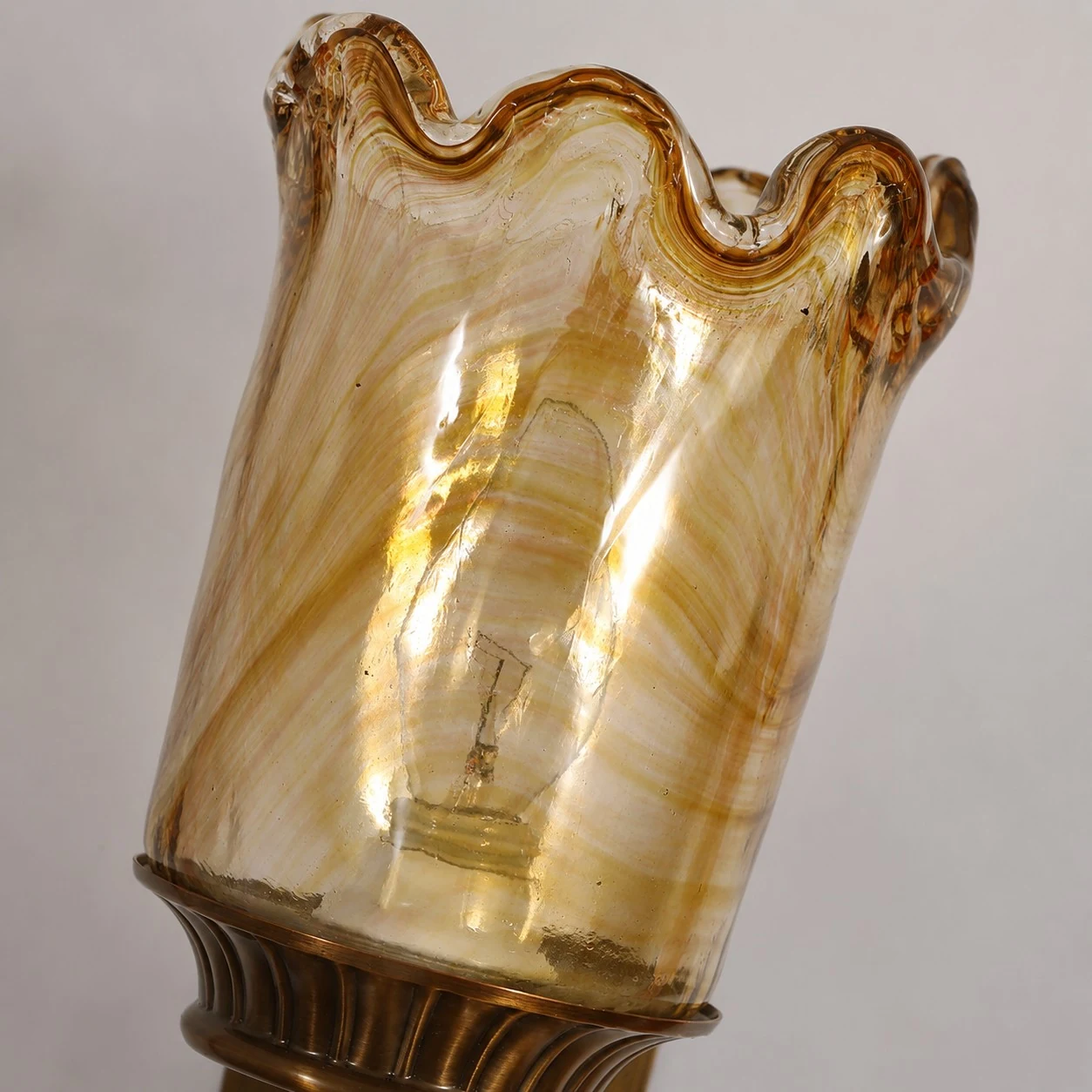 Amber marbled glass shade with scalloped rim detail