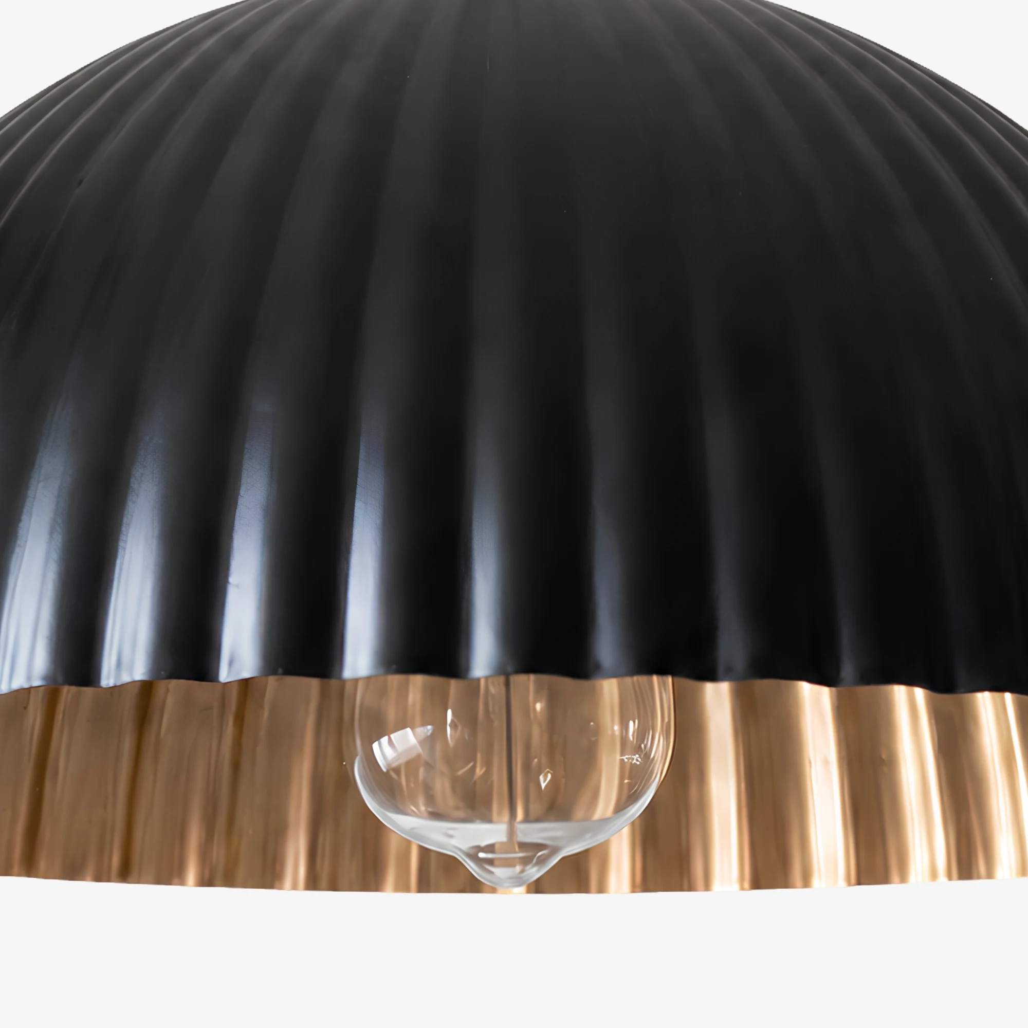 Gold interior and ribbed black metal shade detail