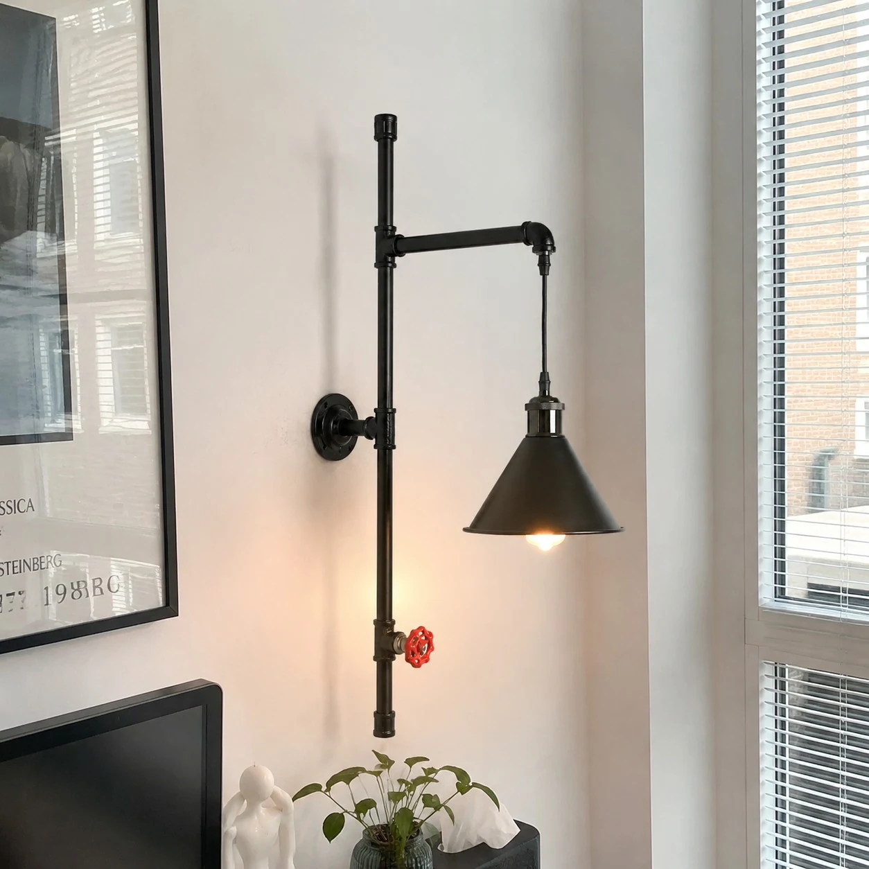 Metal cone shade installed beside window