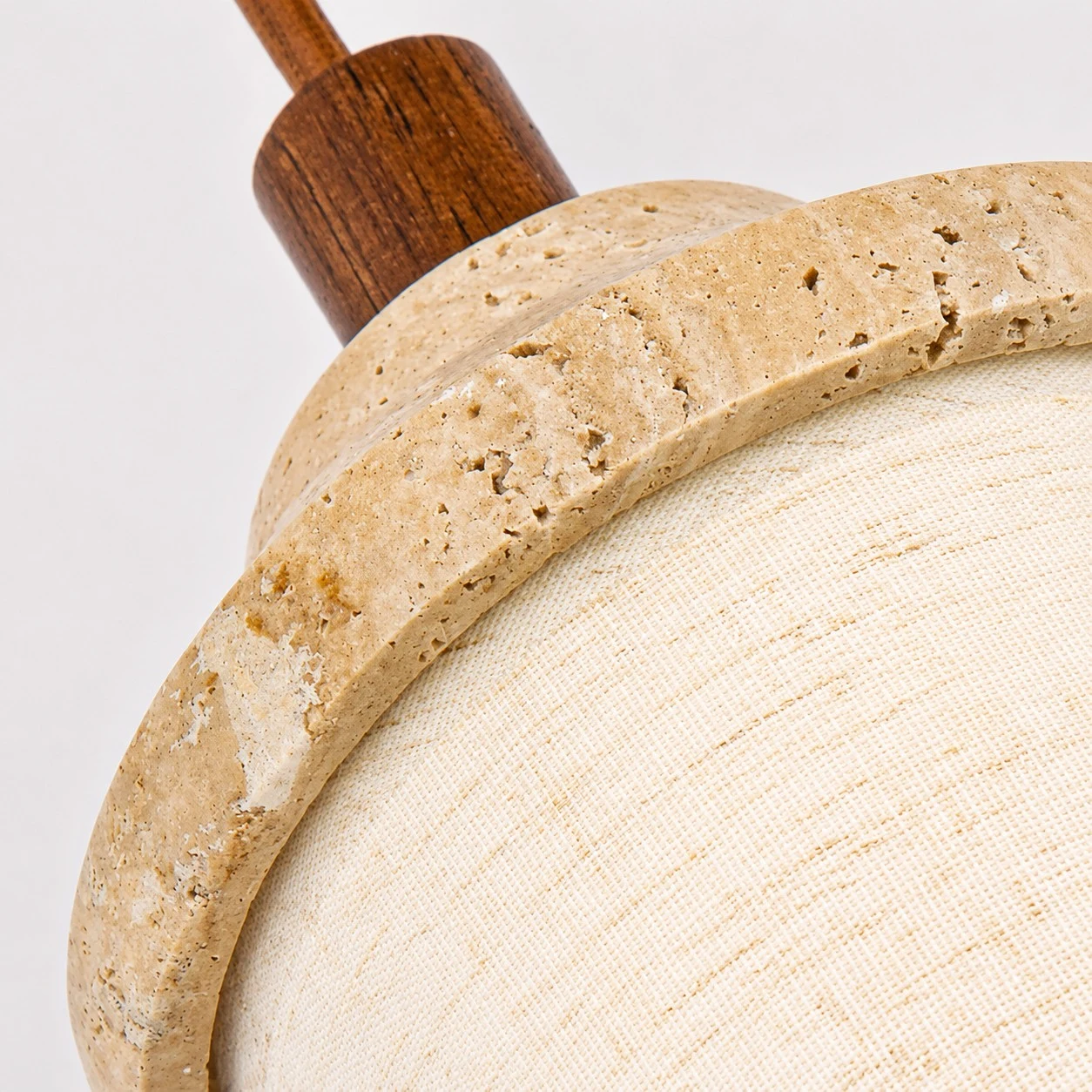 Rounded stone rim and natural pitted surface close-up