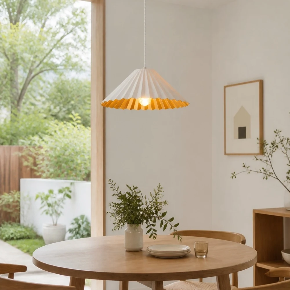 White metal dome pendant lamp in a bright dining nook