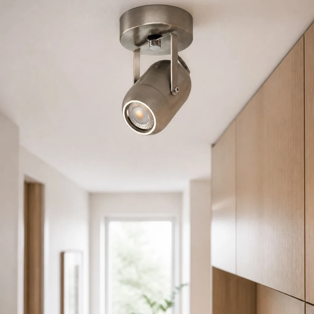 Sand nickel LED wall lamp installed in a hallway