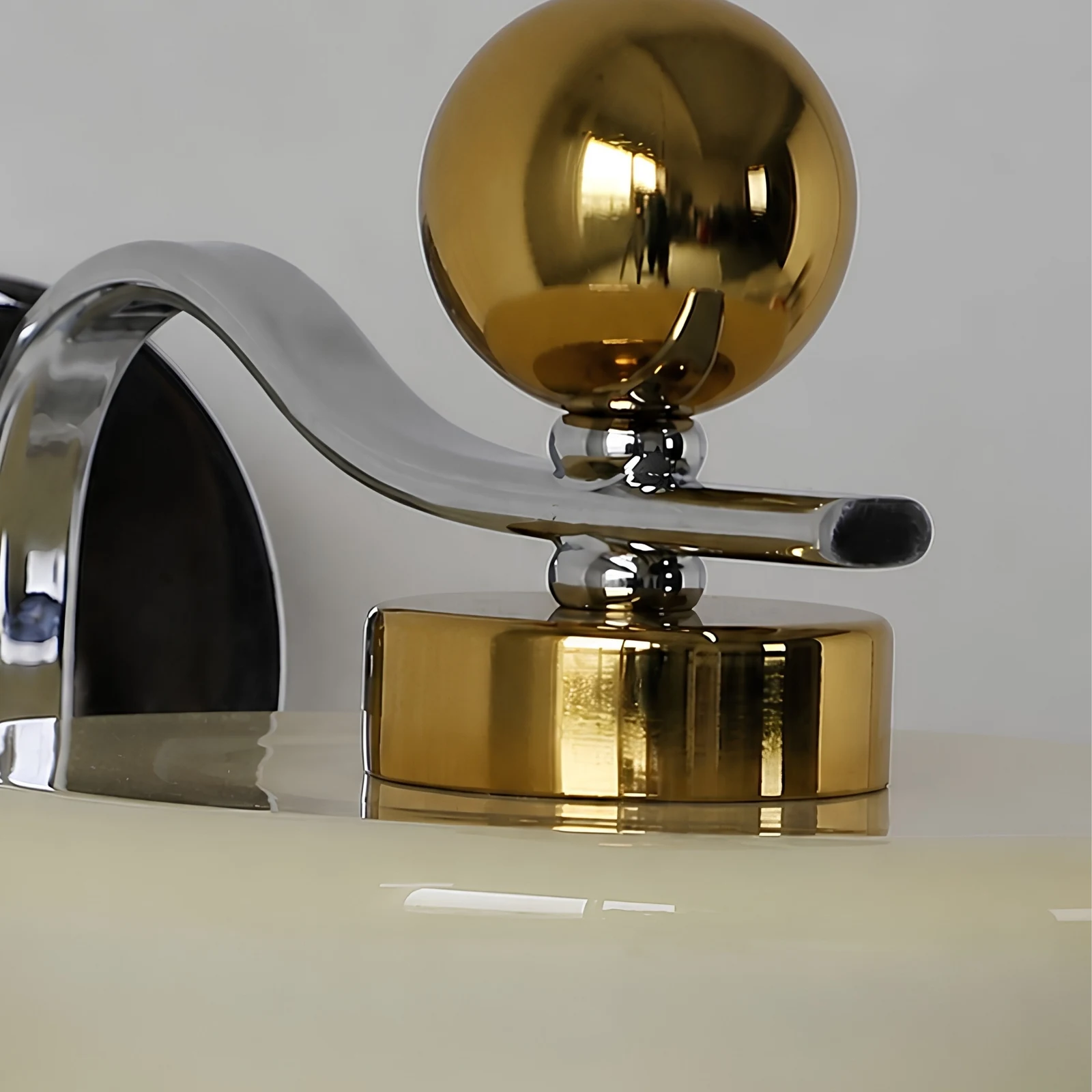 Brass-tone top accent and glass shade detail