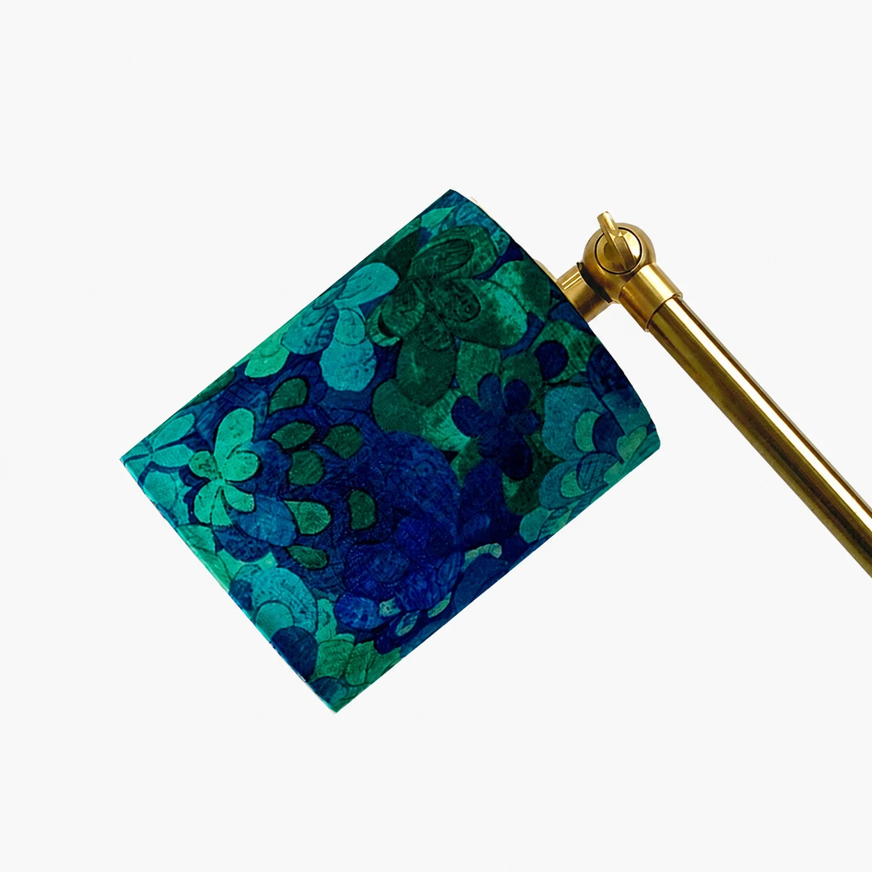 Close view of the blue green floral printed fabric shade and top joint