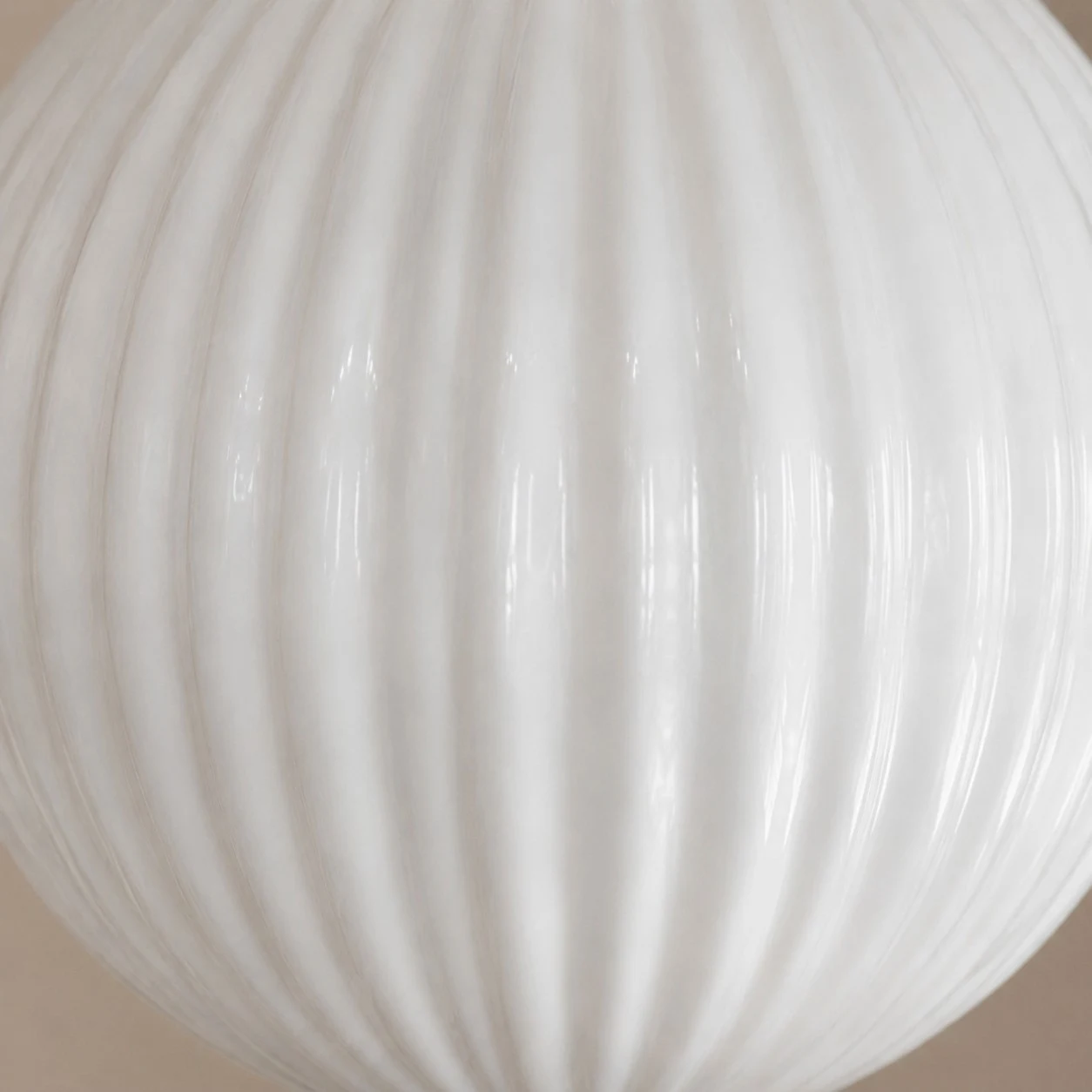 Close view of ribbed milk glass texture
