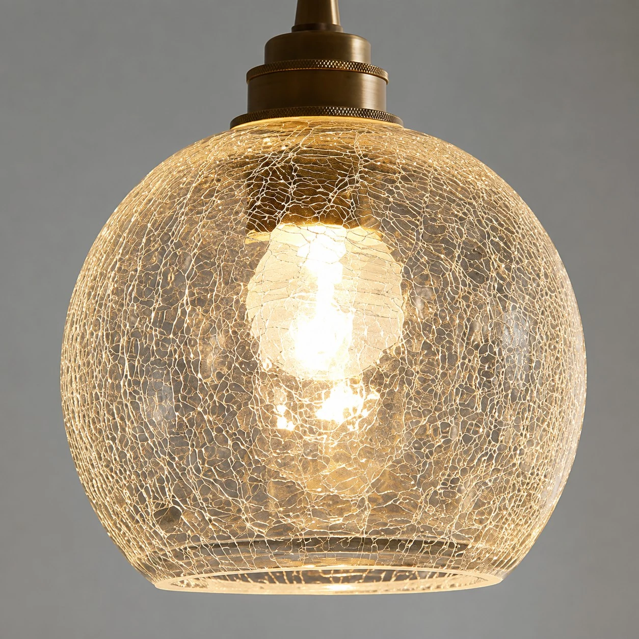 clear crackle glass shade glowing with warm light