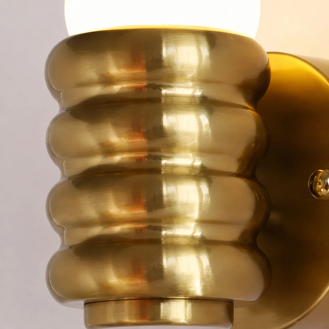 Close detail of brass ribbed metal shade