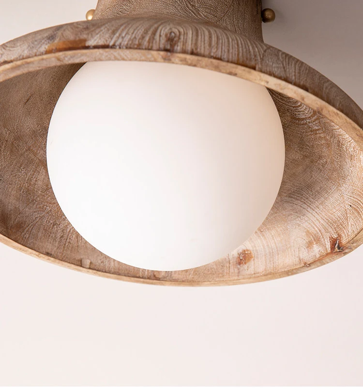Underside view of the wood shade and opal glass globe