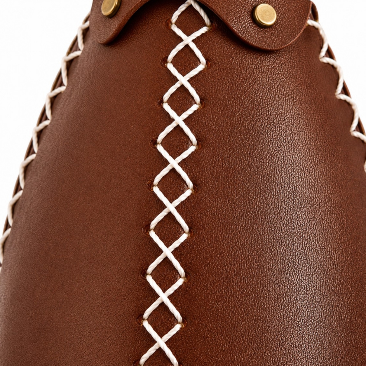 Close view of stitched brown leather shade texture
