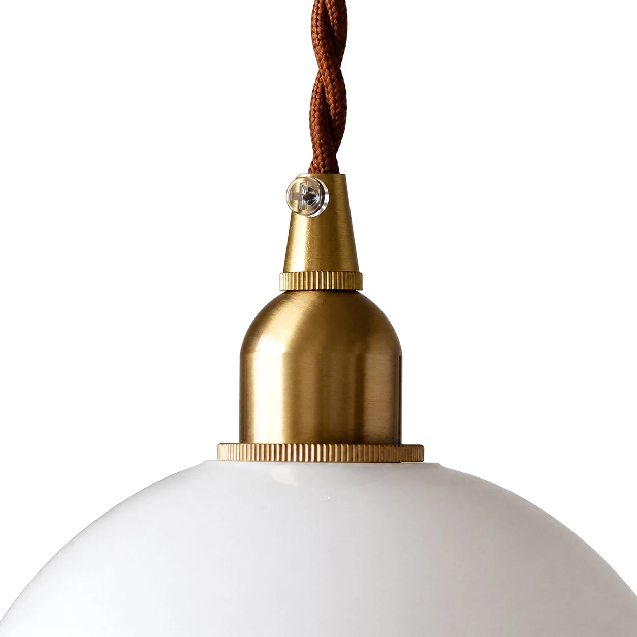 brass pendant holder and glass shade close up