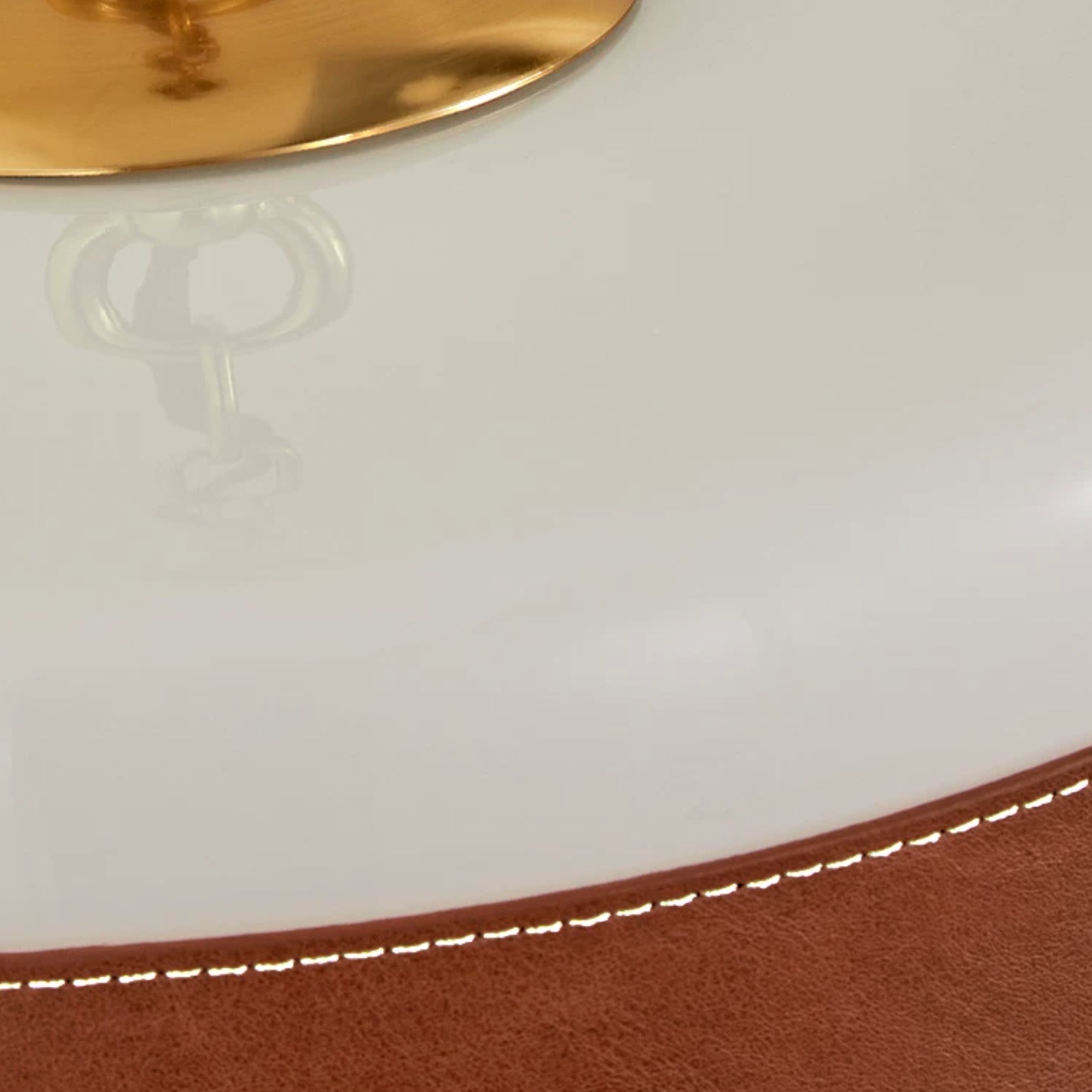 Milky glass texture and brass underside detail