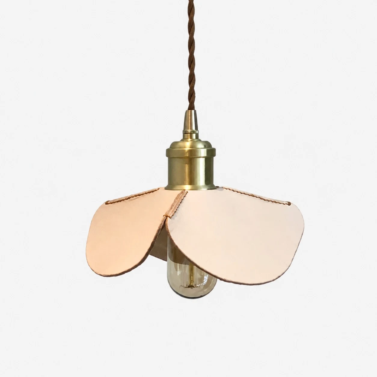 Hand-stitched leather petal pendant light with brass-tone metal hardware