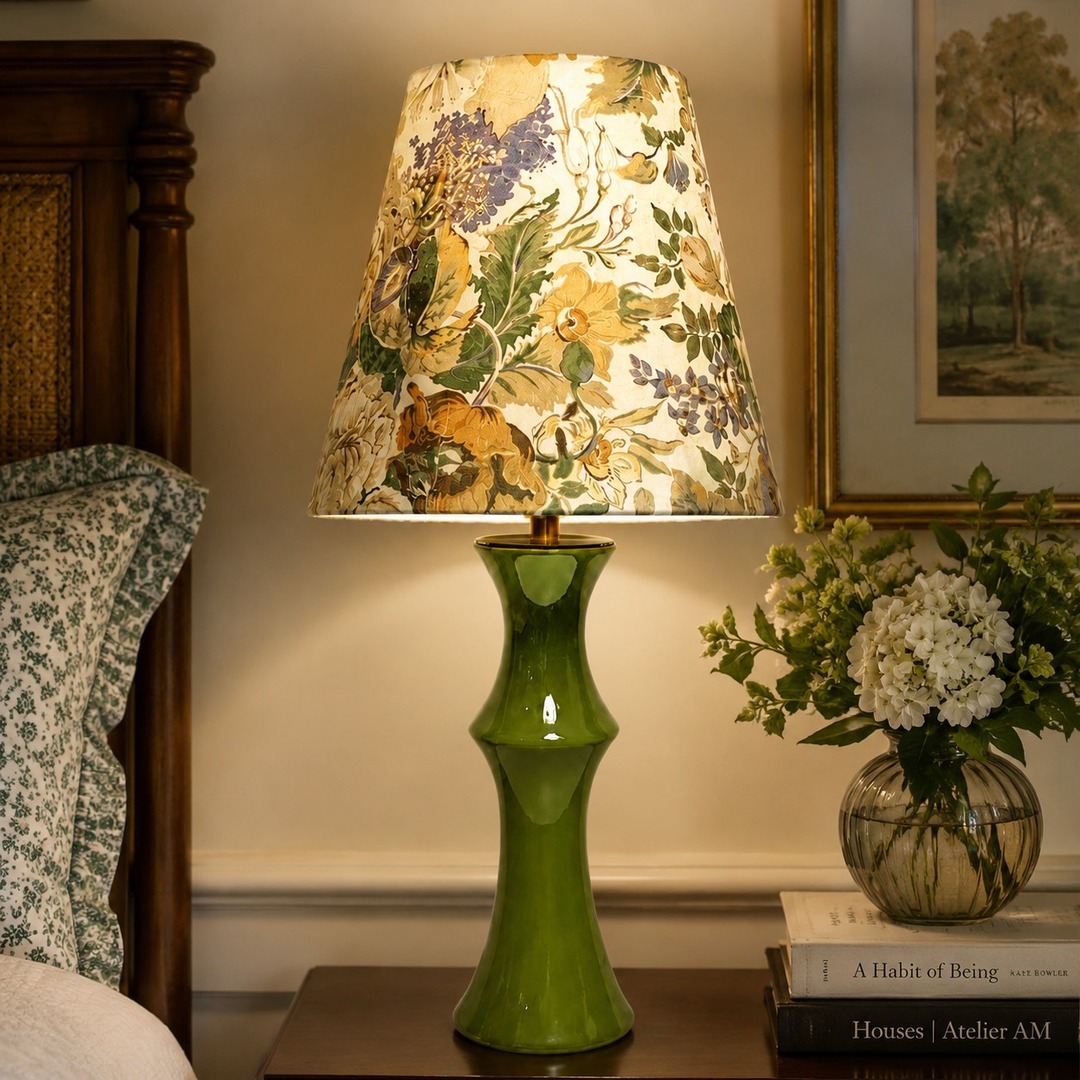 Beige floral table lamp on a bedroom side table