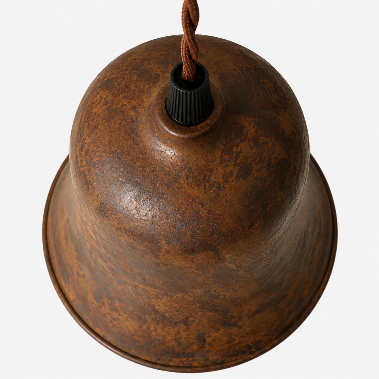 Top view of rust bell pendant shade and cord holder