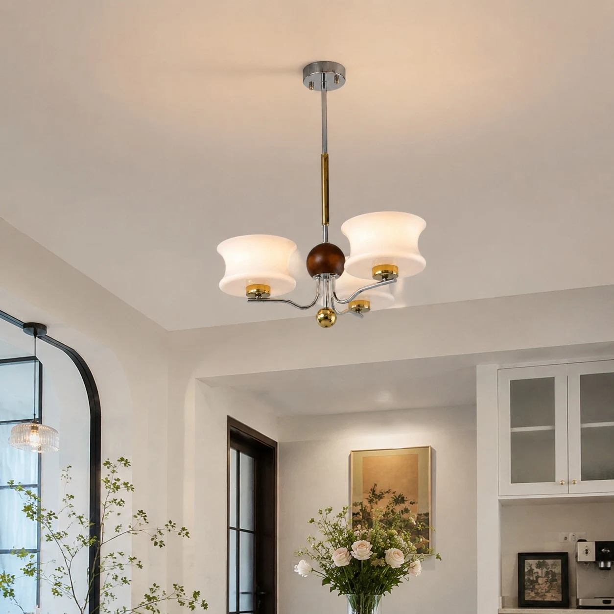 White glass chandelier mounted close to the ceiling