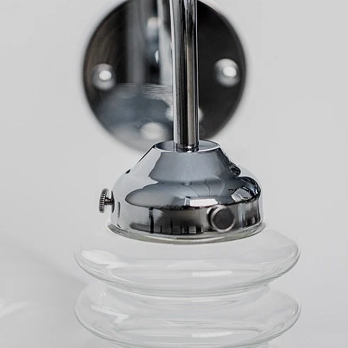 Chrome holder and clear ribbed glass shade detail