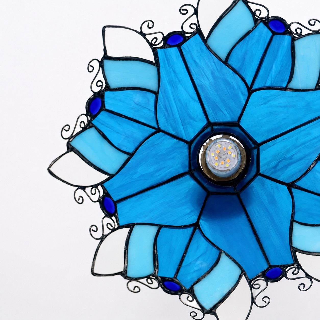 Blue Stained Glass Wall Sconce With Curved Arm