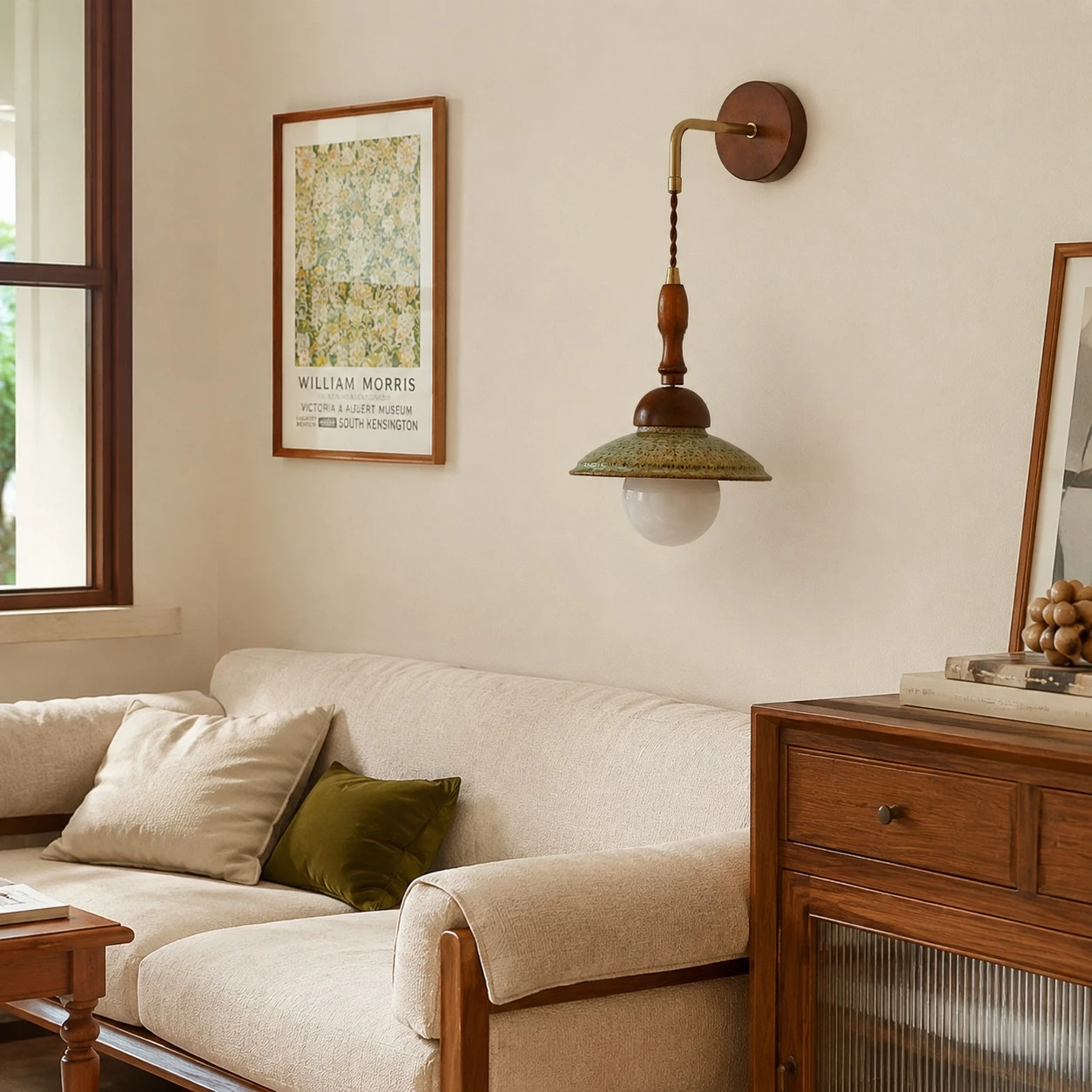 Wabi sabi wall sconce installed beside a sofa and wooden cabinet in a calm living room