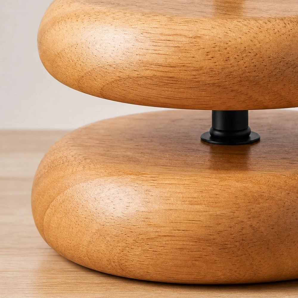 Close detail of smooth rounded wood table lamp base