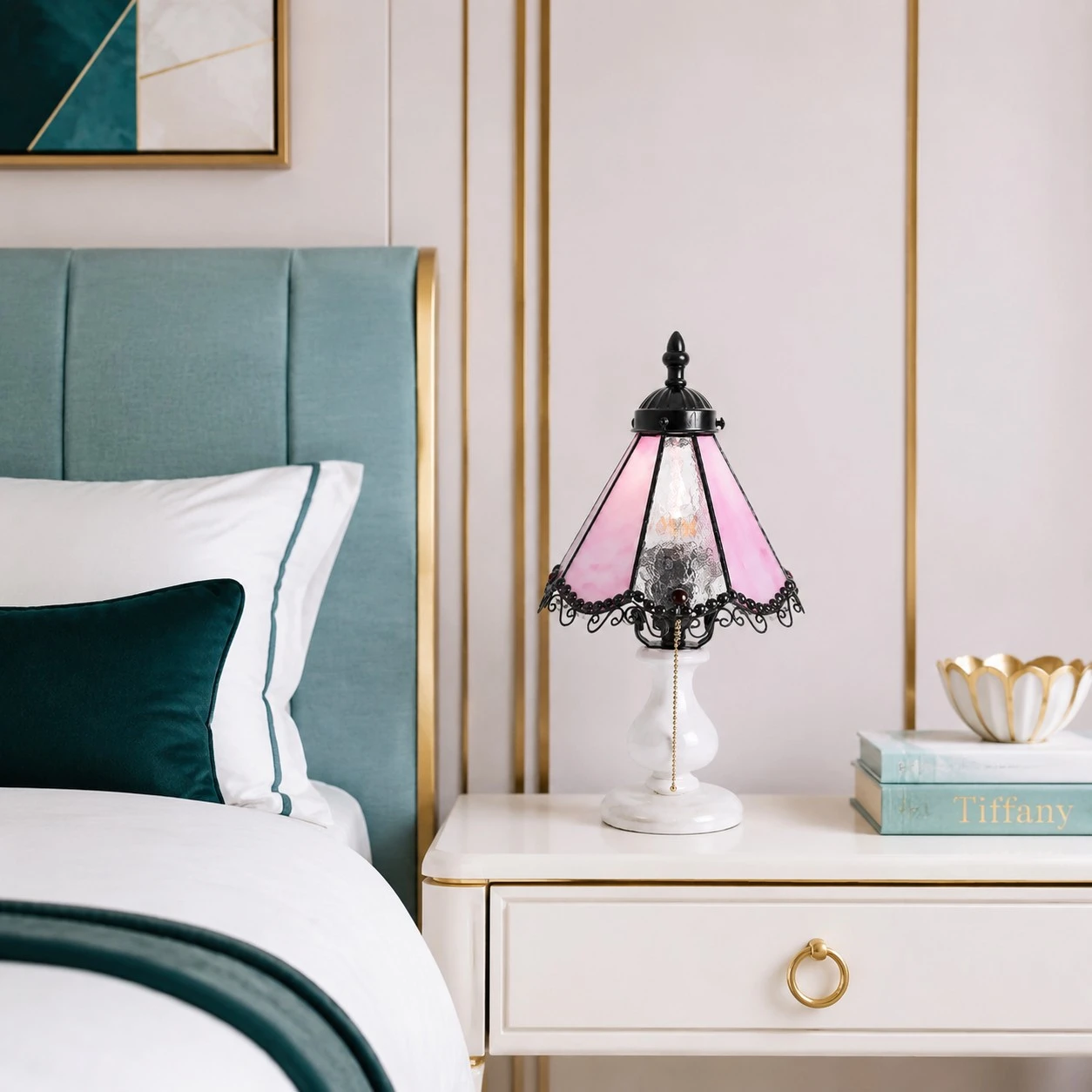 Cherry blossom pink stained glass table lamp on a nightstand beside a bed