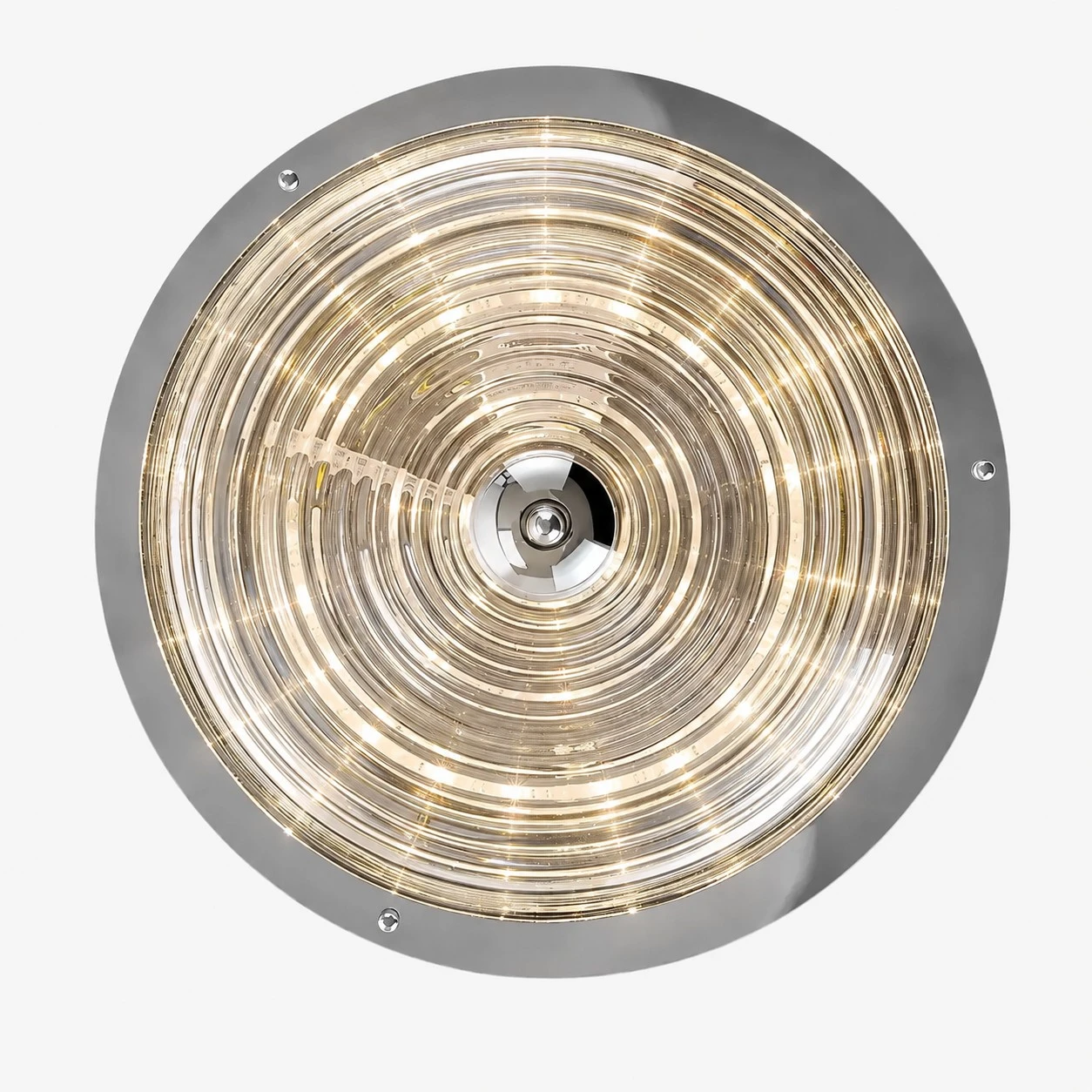 Bottom view of concentric rippled glass pattern with warm light