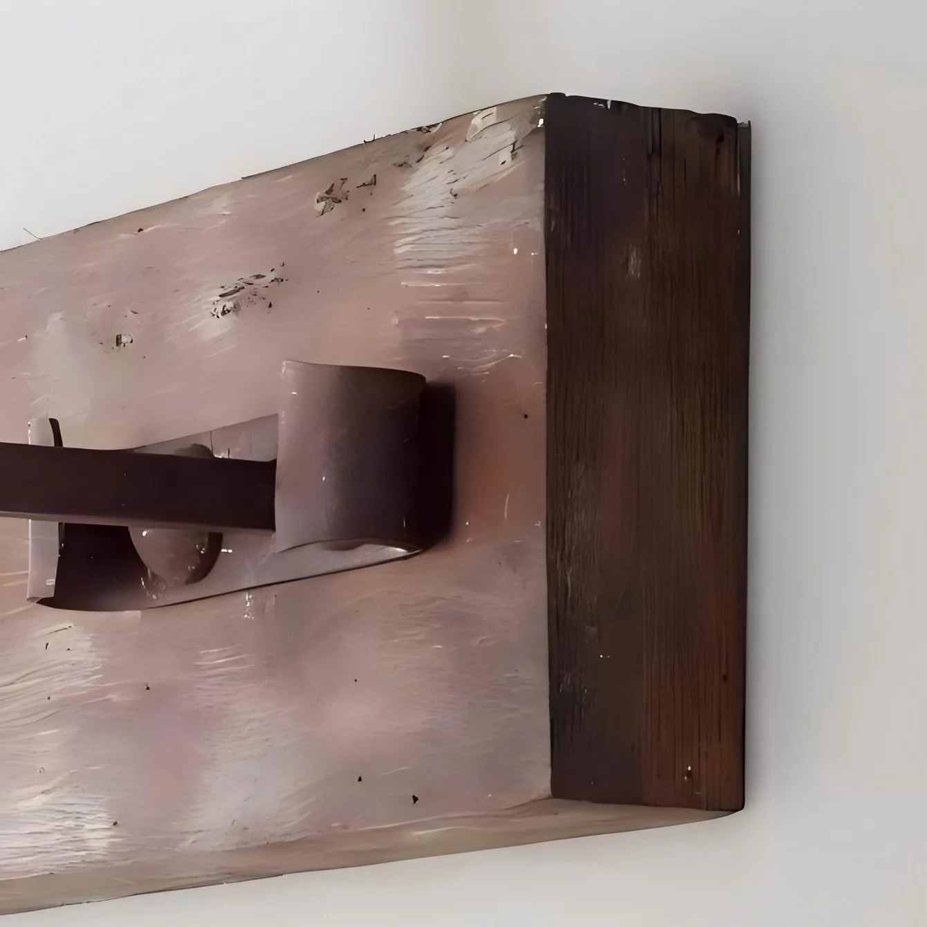 Side detail of the distressed wood backplate and wall mount depth
