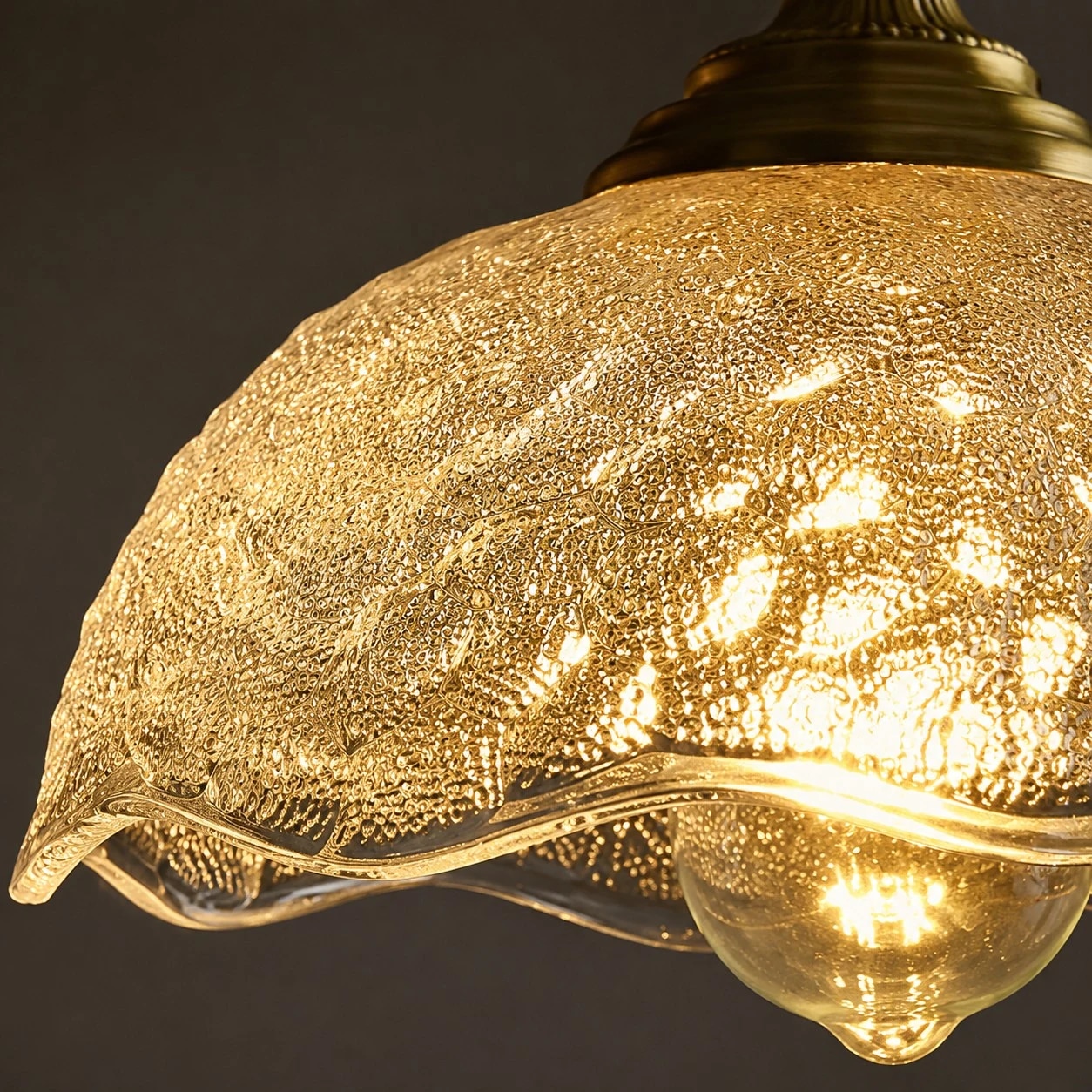 Close-up of scalloped pressed glass texture