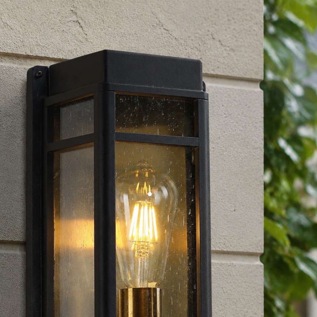 Clear glass shade and outdoor wall sconce detail