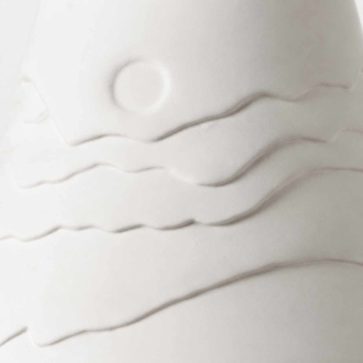 Close view of the sculpted ceramic surface