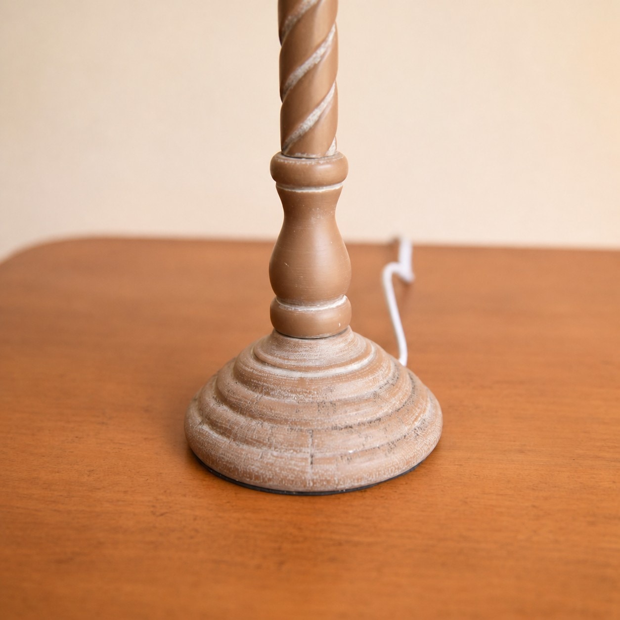 Carved wooden table lamp base close detail
