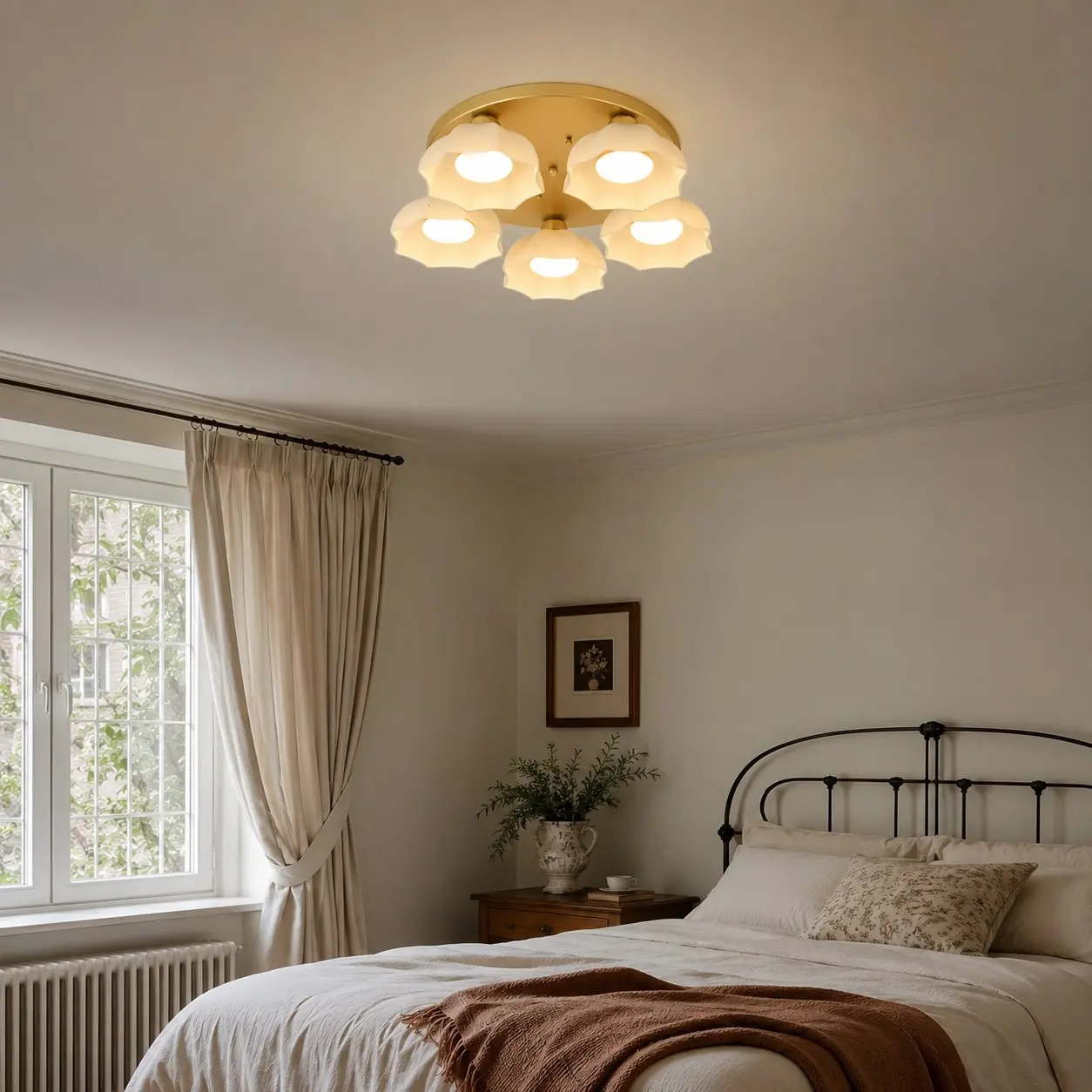 Modern bedroom with a gold and white glass ceiling light