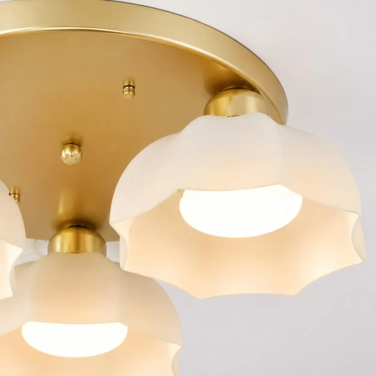 White glass shade and gold finish detail